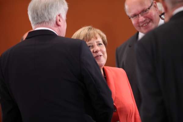 Horst Seehofer, Angela Merkel und Peter Altmaier, über dts Nachrichtenagentur