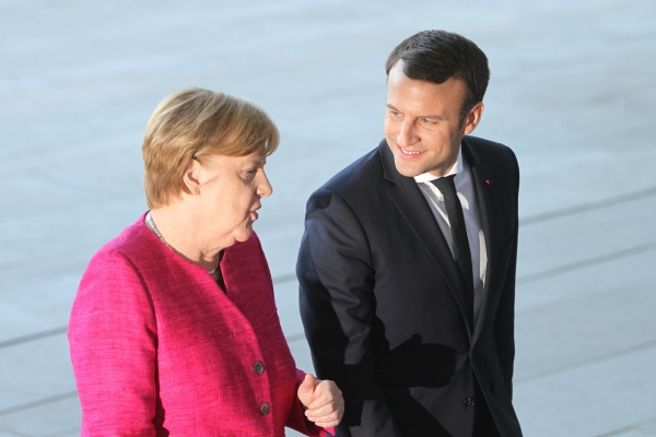 Angela Merkel und Emmanuel Macron, über dts Nachrichtenagentur
